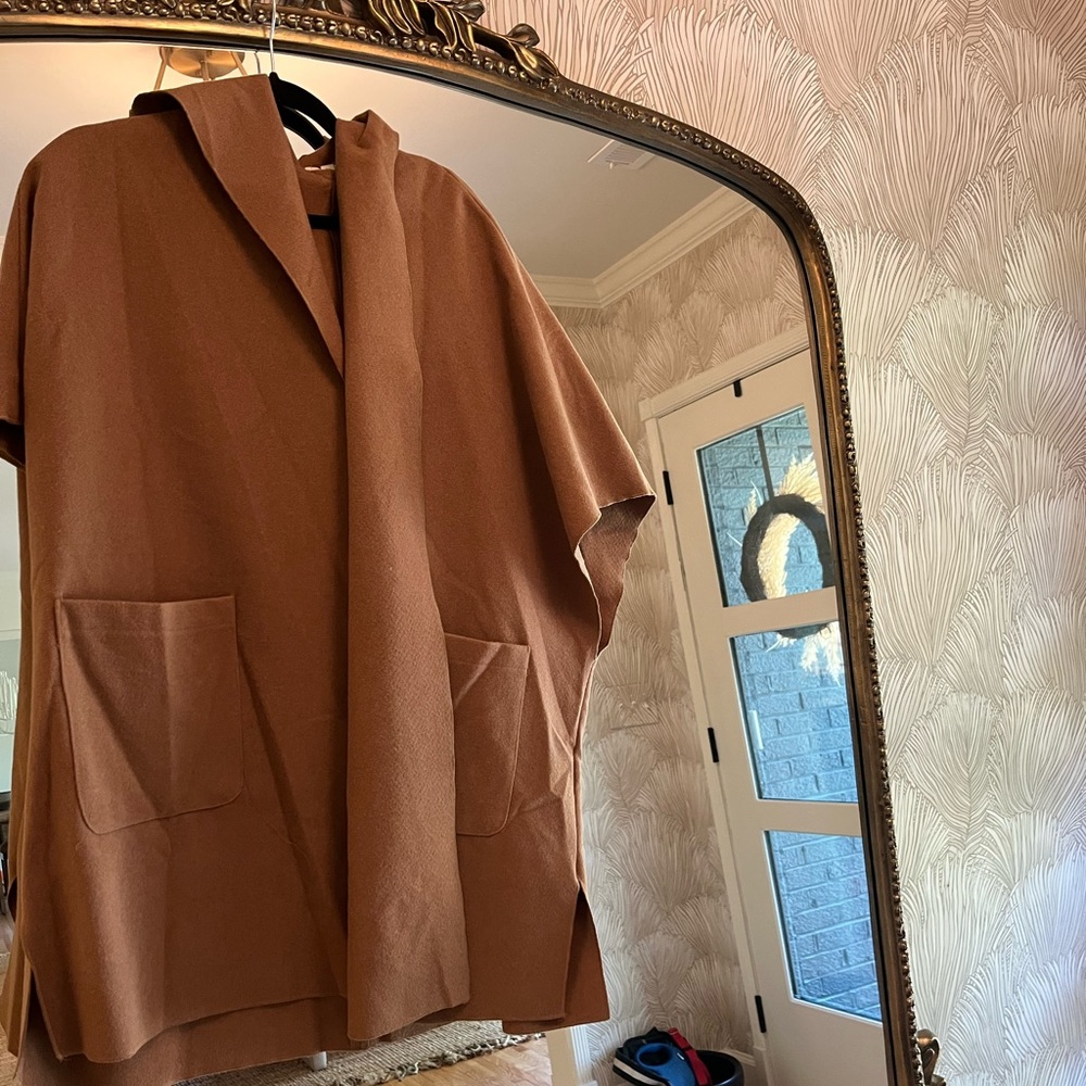 Listicle poncho never worn